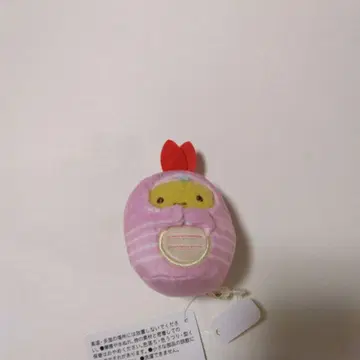 핑크색 봉제 인형 빨간색 리본 포함