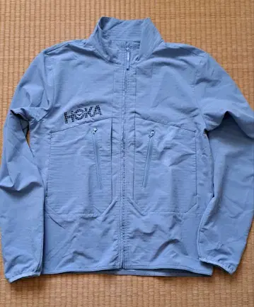 HOKA 라이트 블루 나일론 자켓