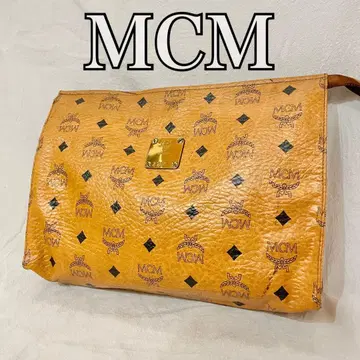 MCM 클러치백 세컨드 백 가죽 브라운 계열 금장 장식 로고 올 패턴