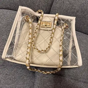 크림색 투명 숄더백