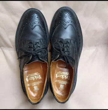 새상품급 트리커스 버튼 세븐하프 블랙