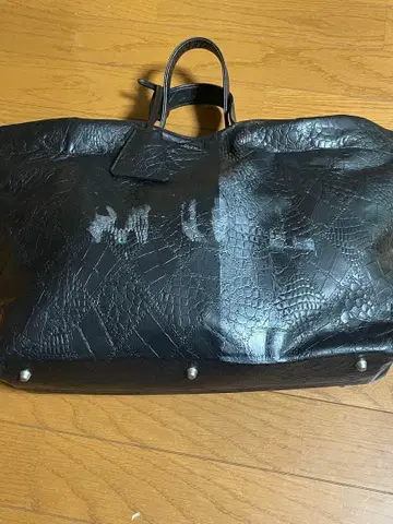 블랙 가죽 엠보 벤트 토트 M.U.L