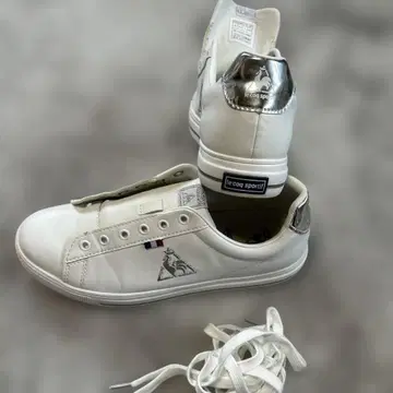 르꼬끄 스포르티브 화이트 스니커즈