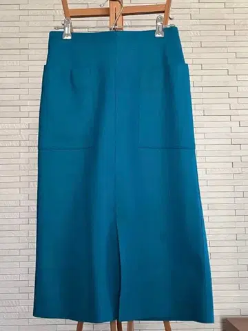 Plage 무릎 아래 기장 타이트 스커트 앞 포켓 부착