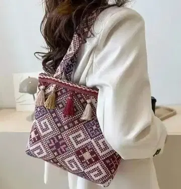태슬 달린 숄더백