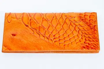 새상품 오렌지 엠보 가죽 장지갑