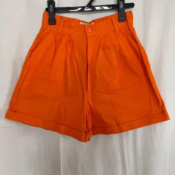 베네통 오렌지 팬츠