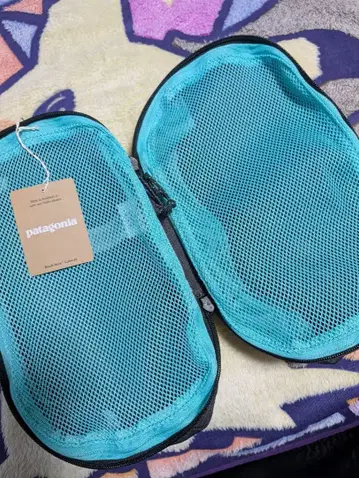 patagonia 블랙홀 큐브 6리터 블랙/터콰이즈