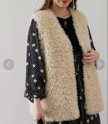 어반 리서치 새상품급 베이지 푸들 퍼 베스트