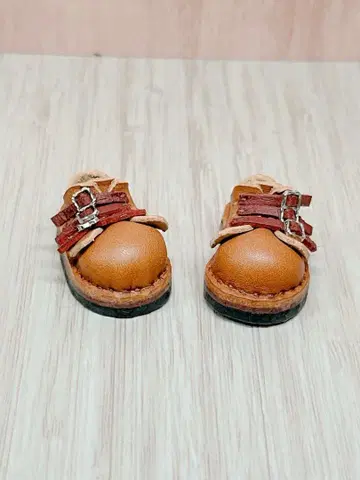 브라이스 이마 벨트 카멜