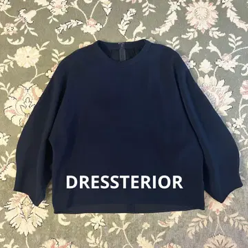 드레 스테리아 던보루컷 블라우스