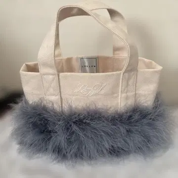 라들로 그레이 퍼 트리밍 토트백