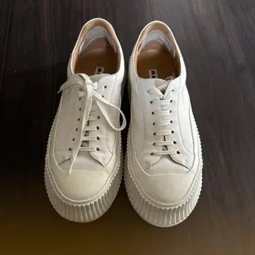 JIL SANDER 화이트 가죽 스니커즈