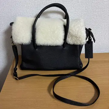 POTIOR 블랙 무스탕 숄더백