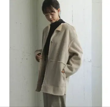 리버서블 무스탕 미디 코트