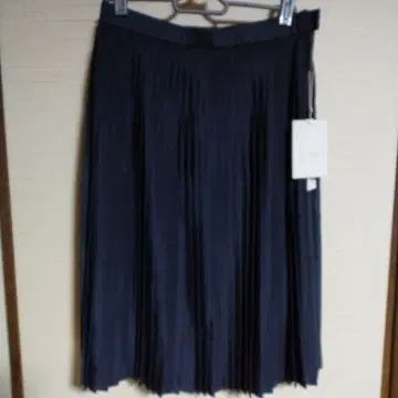 자유구 택 포함 플리츠 스커트