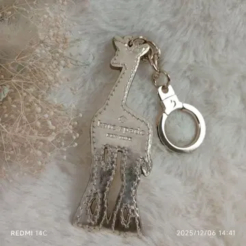 [ kate spadeNEW YORK ] 골드 가죽 기린 키링 새상품급