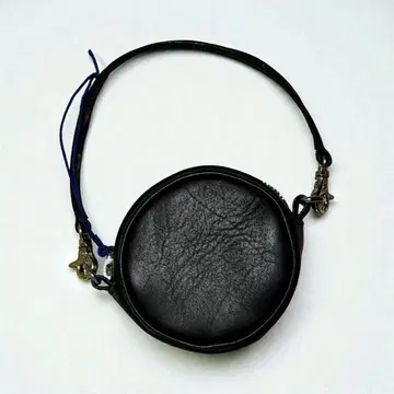 Unlikely Leather Reel Case