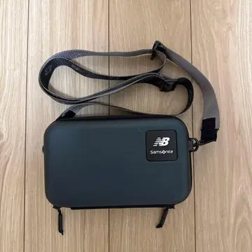 뉴발란스 삼소나이트 숄더백