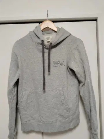 THE CRIMIE 그레이 백 프린트 후드티