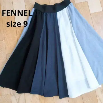 페넬 이소재 절개 플레어 스커트 무릎 아래 미디 기장