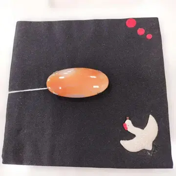 마노 오렌지 컬러의 계란형 오비 고정 띠