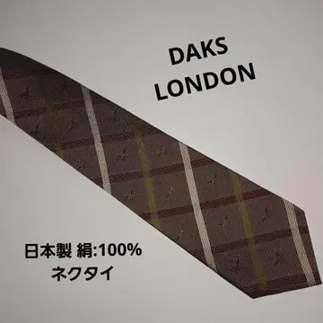 DAKS 실크 체크 안쪽으로 튀는 말 패턴 넥타이