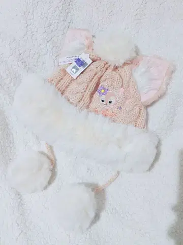 고양이 귀 달린 핑크 니트 모자