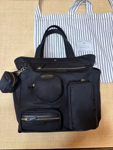 안야 힌드마치 코뮤터 토트 블랙 복수 포켓 부착