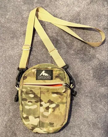 GREGORY 카모플라쥬 구형 로고 퀵 포켓 바디백 M