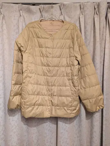 coca 베이지 다운 자켓