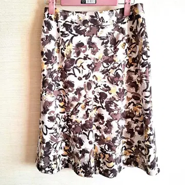 쿠 드 샹스 꽃무늬 플레어 스커트