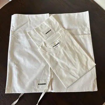 질샌더 화이트 티셔츠 수납 가방 포함