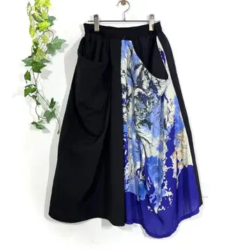 패턴 토르소 이소재 비대칭 플레어 스커트 블랙 댄스 넉넉한