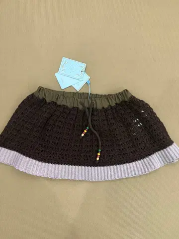 COYSEIO 브라운과 핑크 미니 스커트