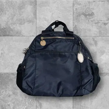 카나나 프로젝트 | 신축 타입 네이비 나일론 백팩