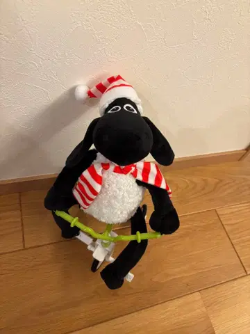 숀더쉽 자전거를 탄 숀더쉽 봉제 인형