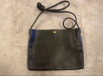 새상품급 일비종떼 숄더백 사선 로고 엠보 가죽 블랙