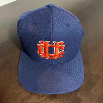 네이비 야구 모자 오렌지 로고