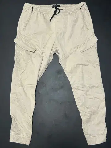 베이지 카고 팬츠 드로우 스트링 포함