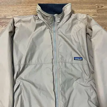 파타고니아 쉘드 신틸라 L 카멜 베이지 탄 코요테