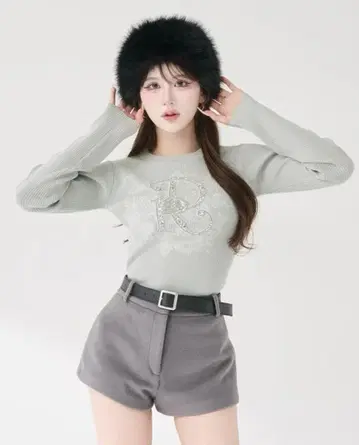 다리치 로고 니트탑