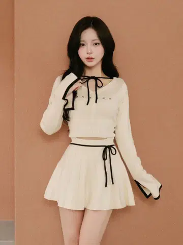 다리치 Darich 허리 오픈 리본 디자인 니트 미니 원피스