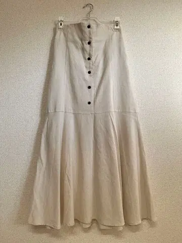 아이보리 생성 버튼 플레어 스커트 F