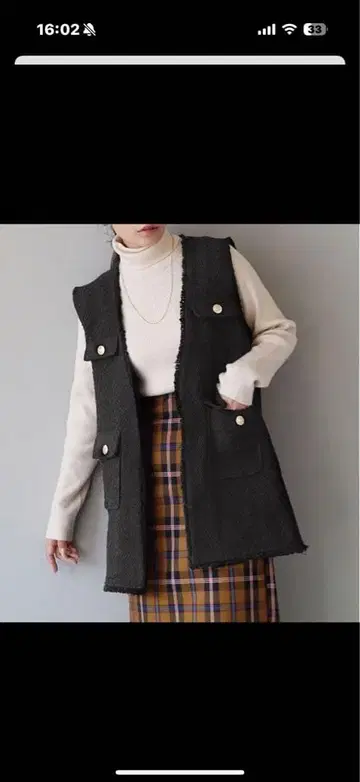 캐주얼한 블랙 프린지 베스트