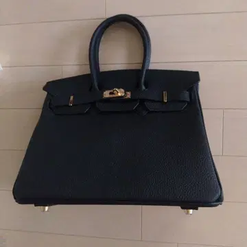 블랙 가죽 핸드백 골드 금장 장식