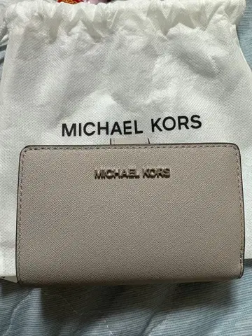 MICHAL KORS