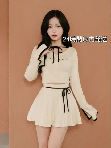 다리치 허리 오픈 리본 디자인 니트 미니 원피스