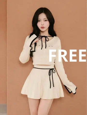 Darich 다리치 허리 오픈 리본 디자인 니트 미니 원피스