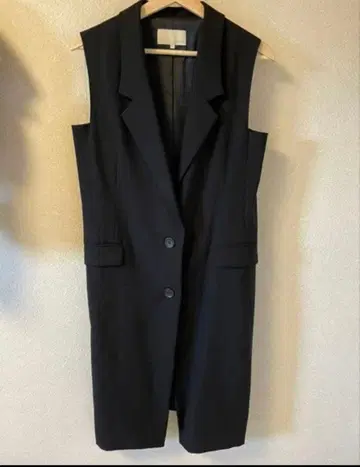 UNITED 블랙 슬리브리스 베스트 폴리에스테르 100%